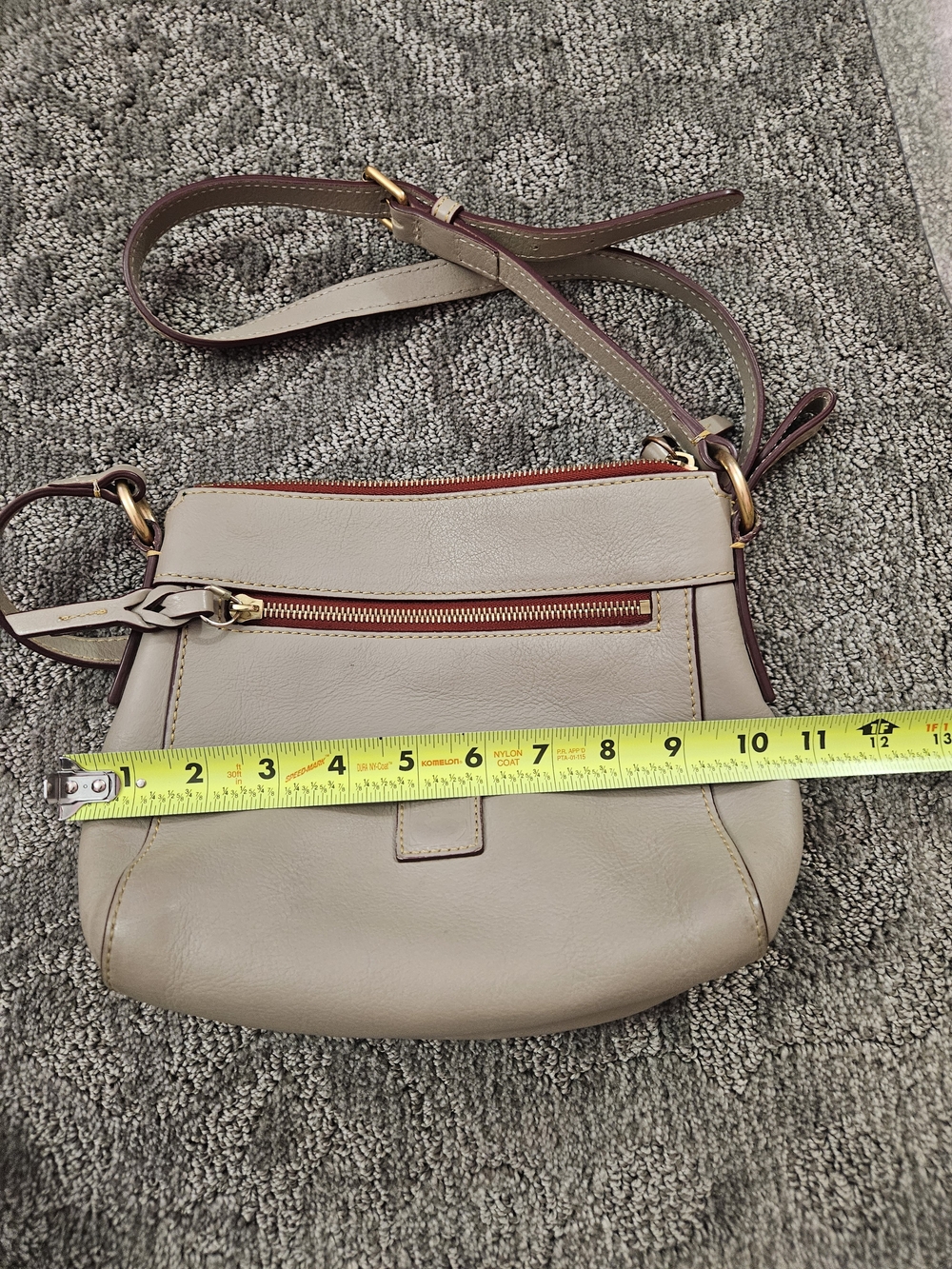 Dooney & Bourke Florentine Allison Crossbody bag is featured in a light taupe - Picture 5 of 6